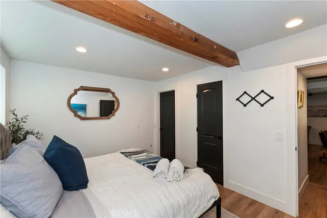 a view of a chairs and table on the wooden floor