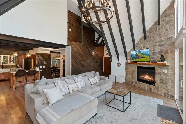 a bathroom with a sink mirror toilet and shower
