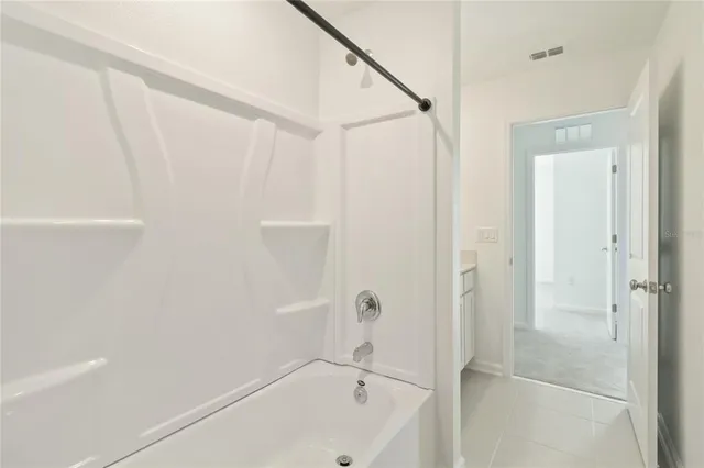 a bathroom with a bathtub
