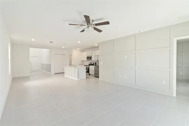 a view of a livingroom with a ceiling fan
