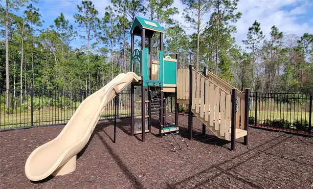 a view of a park with slide
