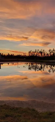 a view of an ocean and city