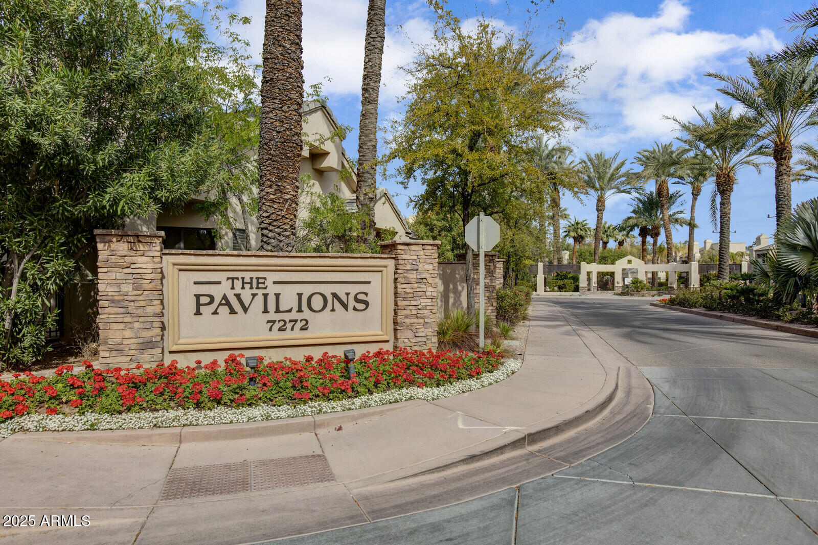 7272 East Gainey Ranch Road, Unit 120 Scottsdale, AZ 85258 - Photo 19 of 26 a street sign on a pole on a street