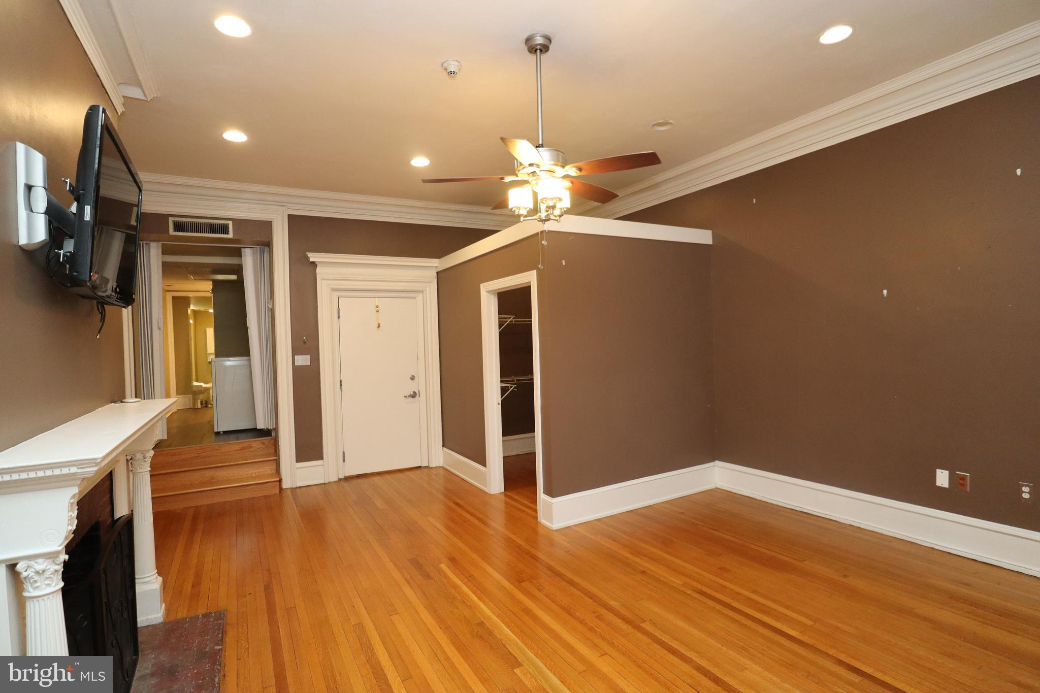 1608 Spruce Street, Unit 2 Philadelphia, PA 19103 - Photo 4 of 19 a view of a livingroom with wooden floor