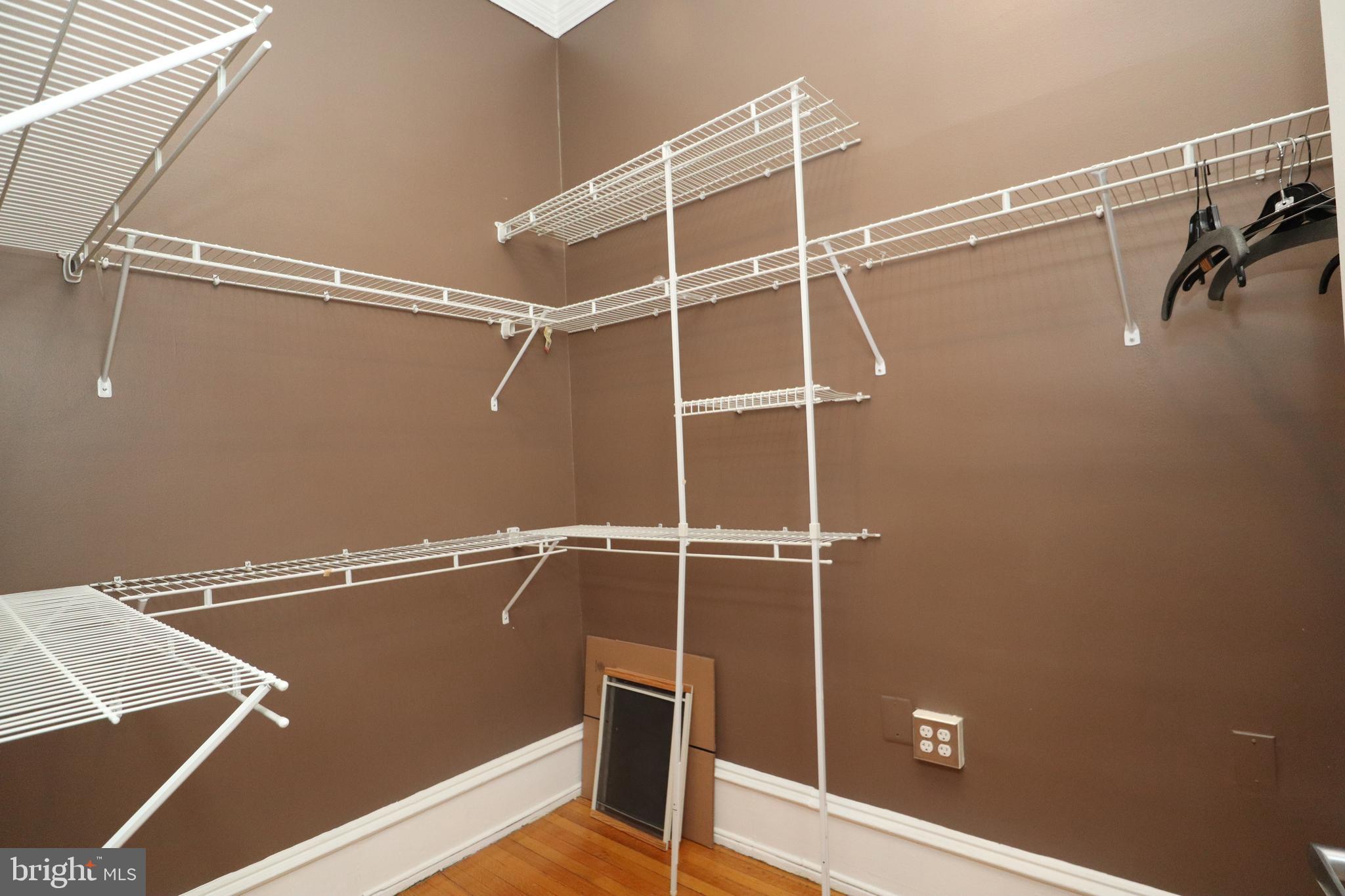 1608 Spruce Street, Unit 2 Philadelphia, PA 19103 - Photo 6 of 19 a view of a room with empty space and wooden floor