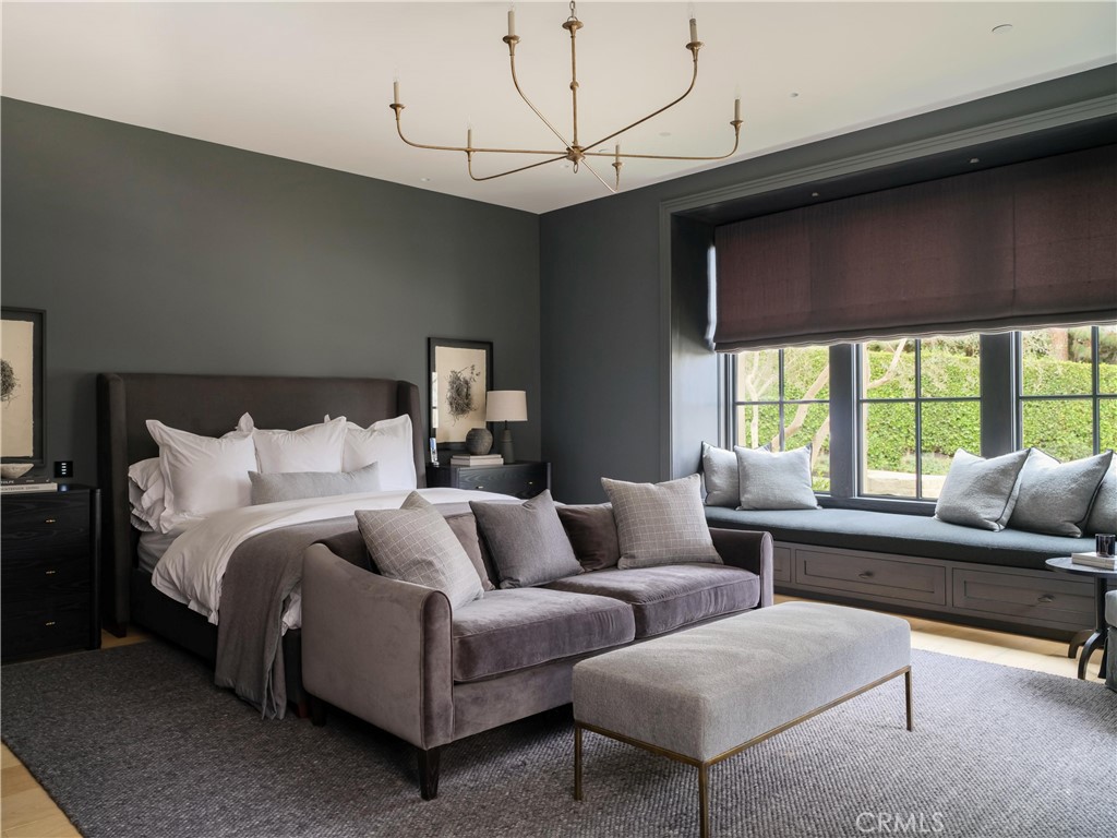 12 Burning Tree Road Newport Beach, CA 92660 - Photo 13 of 32 a living room with furniture and a large window