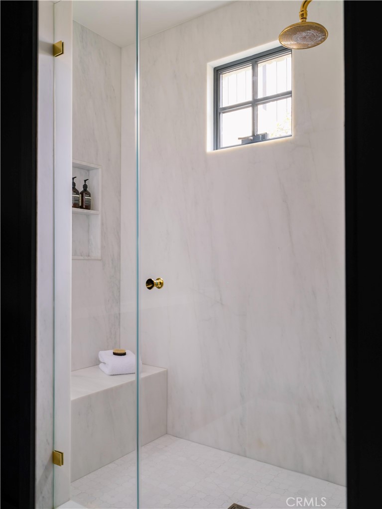 12 Burning Tree Road Newport Beach, CA 92660 - Photo 15 of 32 a bathroom with a bathtub