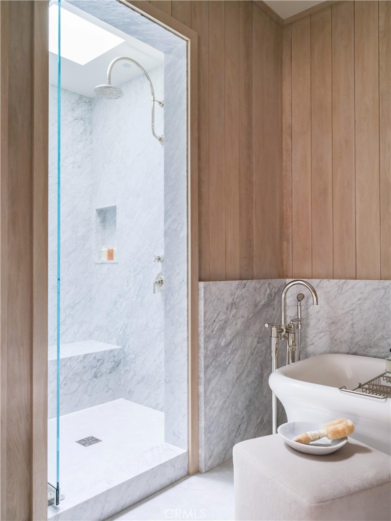 12 Burning Tree Road Newport Beach, CA 92660 - Photo 17 of 32 a bathroom with a sink and a mirror