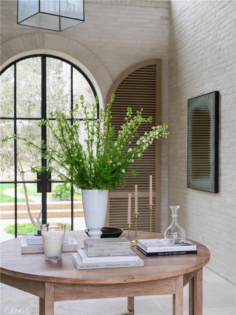 12 Burning Tree Road Newport Beach, CA 92660 - Photo 20 of 32 a vase of flowers sitting on a table