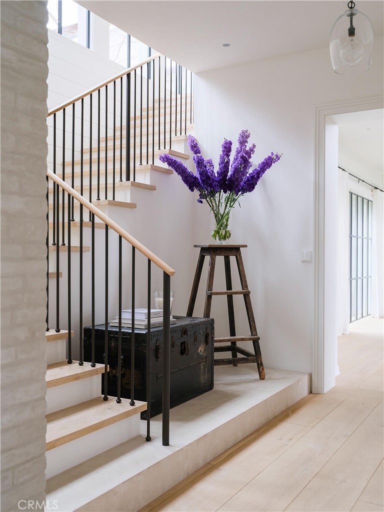 12 Burning Tree Road Newport Beach, CA 92660 - Photo 21 of 32 a view of staircase with white walls