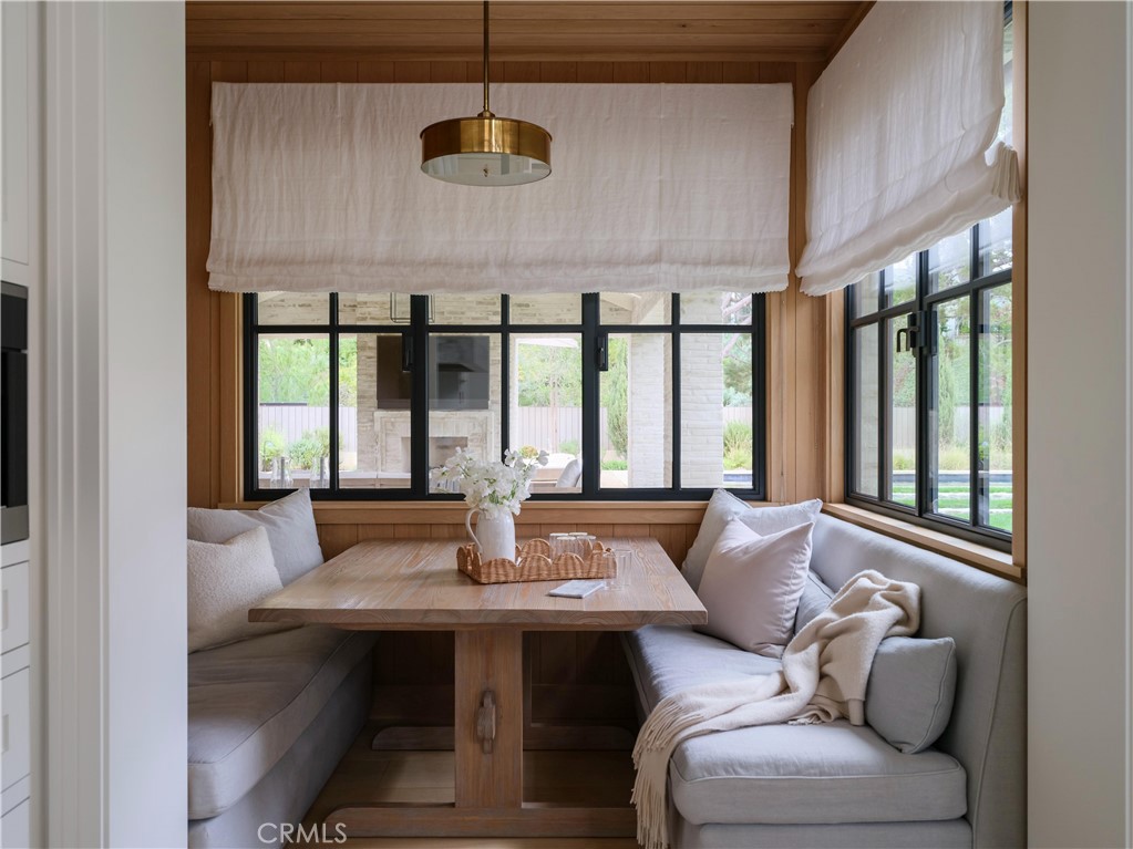 12 Burning Tree Road Newport Beach, CA 92660 - Photo 7 of 32 a view of a livingroom with furniture and window