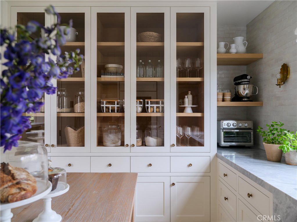 12 Burning Tree Road Newport Beach, CA 92660 - Photo 8 of 32 a kitchen with a sink and a window