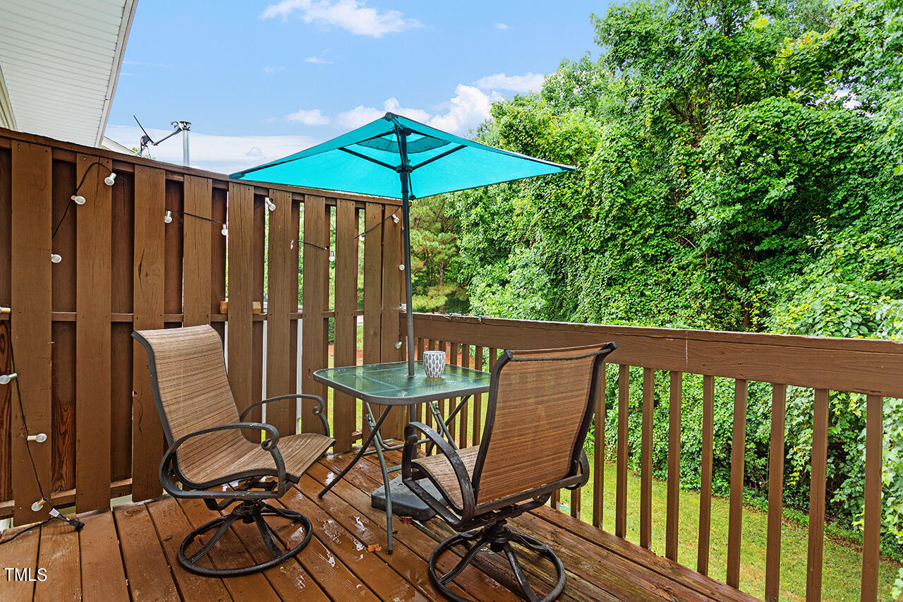 4642 Centrebrook Circle Raleigh, NC 27616 - Photo 4 of 27 Beautiful balcony off the main level provides tranquility ideal for lounging
