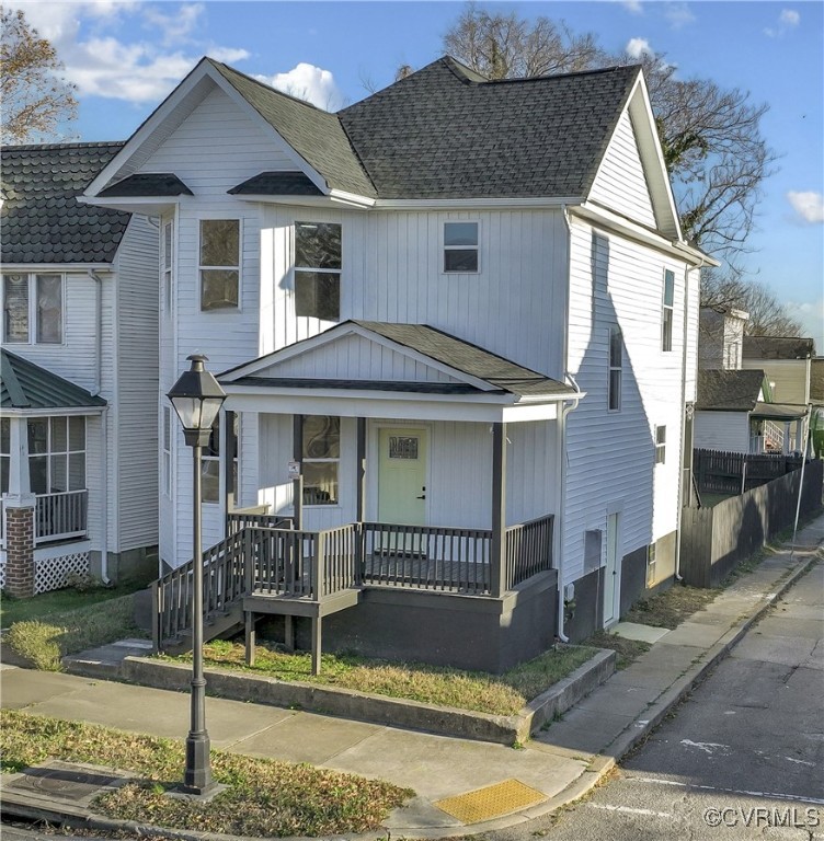 1320 Decatur Street Richmond, VA 23224 - Photo 1 of 36 a front view of a house with a porch