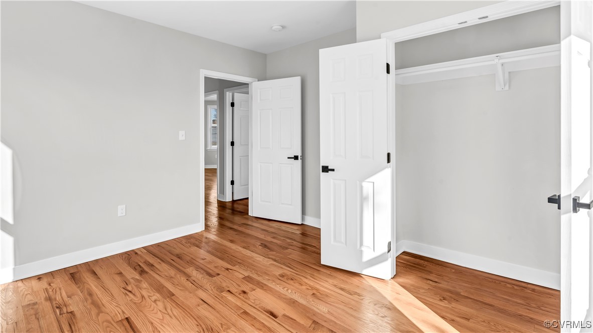 1320 Decatur Street Richmond, VA 23224 - Photo 27 of 36 a view of an empty room with wooden floor