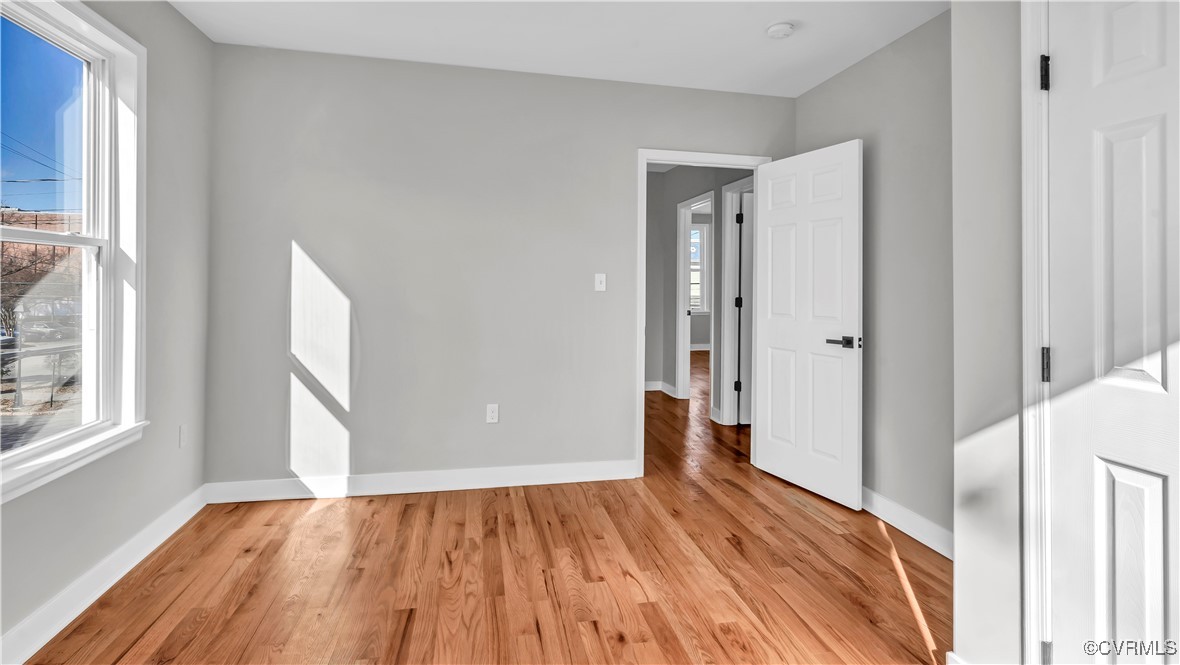 1320 Decatur Street Richmond, VA 23224 - Photo 28 of 36 a view of a room with wooden floor and a window