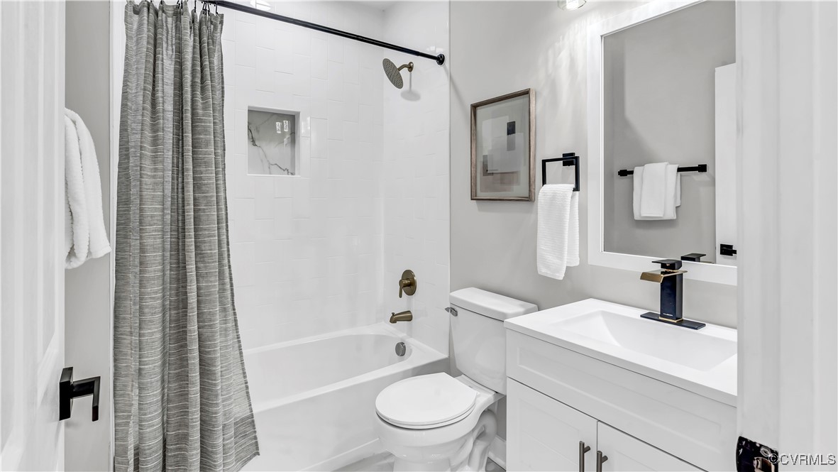1320 Decatur Street Richmond, VA 23224 - Photo 29 of 36 a bathroom with a sink toilet and shower