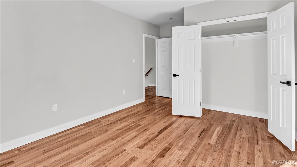 1320 Decatur Street Richmond, VA 23224 - Photo 30 of 36 a view of a room with wooden floor and white walls