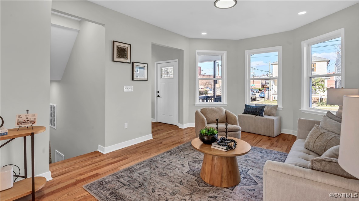 1320 Decatur Street Richmond, VA 23224 - Photo 5 of 36 a living room with furniture and a wooden floor