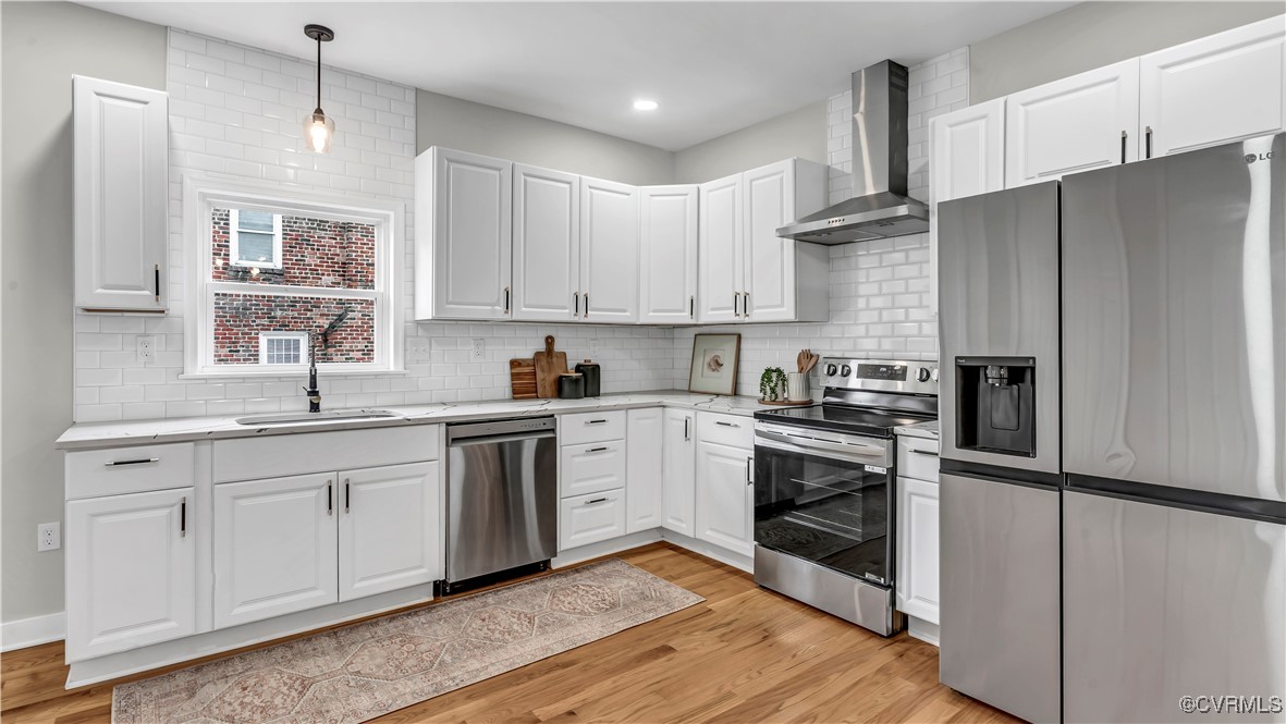 1320 Decatur Street Richmond, VA 23224 - Photo 7 of 36 a kitchen with a sink stainless steel appliances and window
