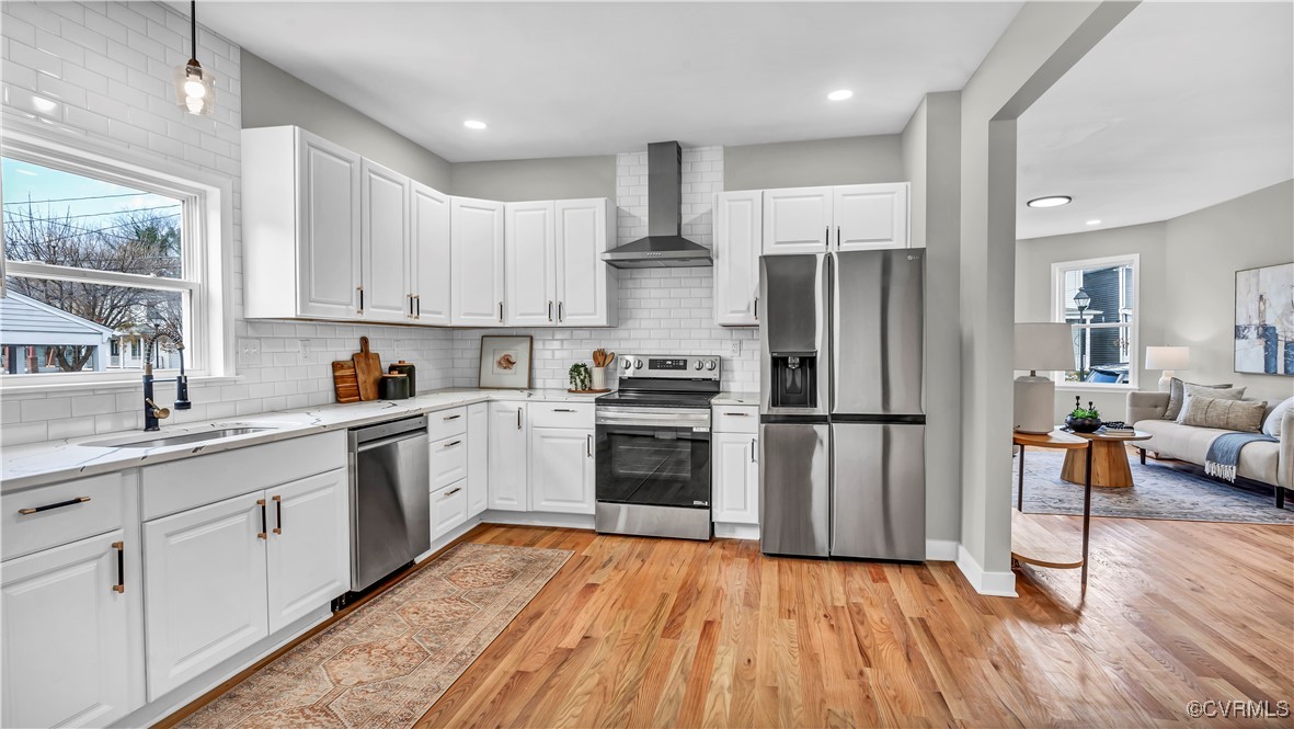 1320 Decatur Street Richmond, VA 23224 - Photo 10 of 36 a kitchen with a refrigerator and a sink