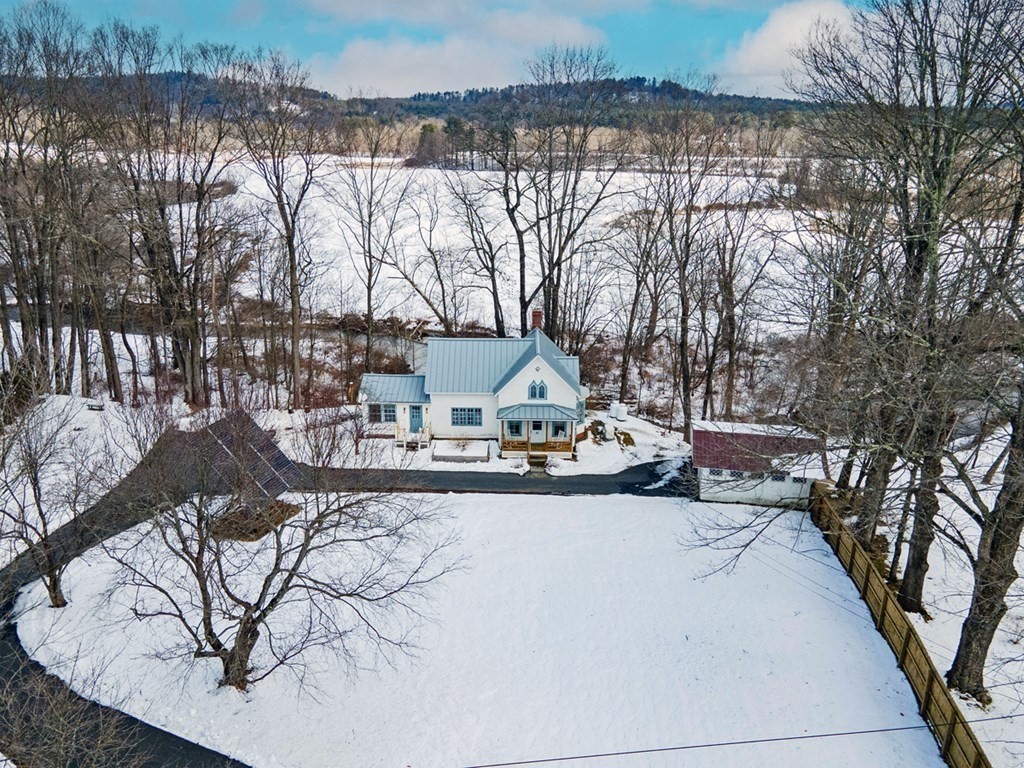 a view of a lake with a yard