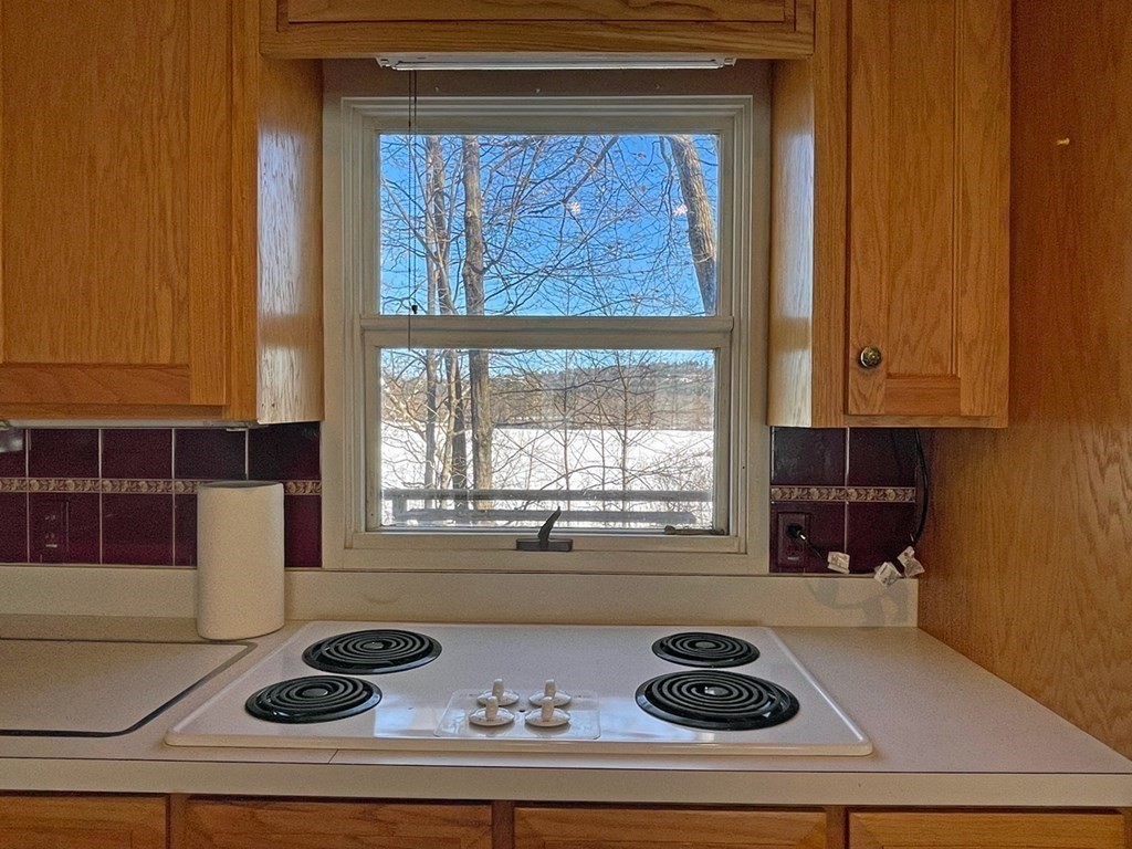 53 Burrows Turnpike Road Bernardston, MA 01337 - Photo 17 of 42 a kitchen with a cabinets and window