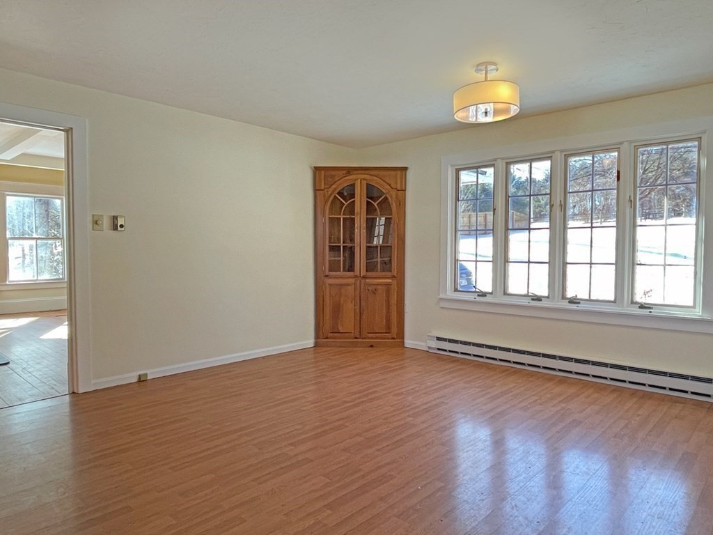 53 Burrows Turnpike Road Bernardston, MA 01337 - Photo 20 of 42 wooden floor in an empty room with a window