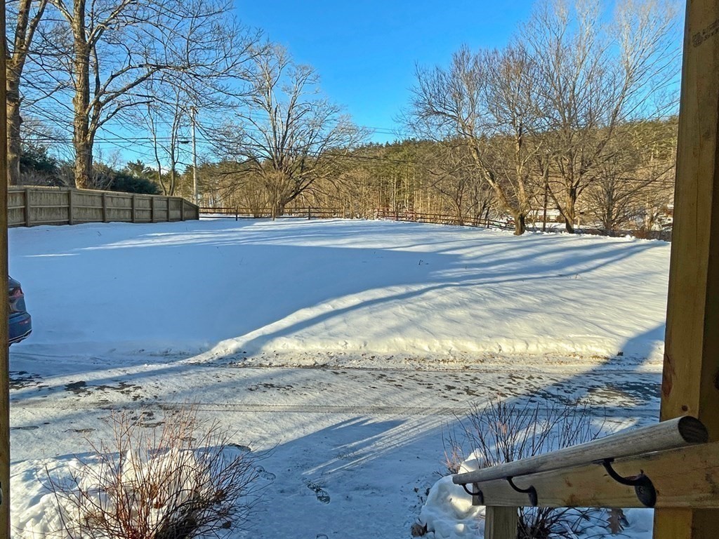 53 Burrows Turnpike Road Bernardston, MA 01337 - Photo 22 of 42 a view of a yard with wooden fence