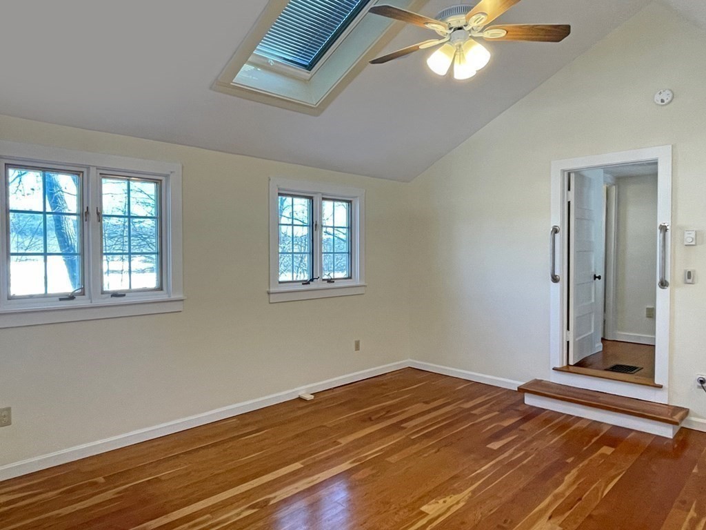 53 Burrows Turnpike Road Bernardston, MA 01337 - Photo 32 of 42 a view of a livingroom with wooden floor and a ceiling fan
