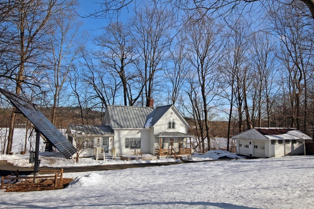 53 Burrows Turnpike Road Bernardston, MA 01337 - Photo 4 of 42 a front view of a house with garden