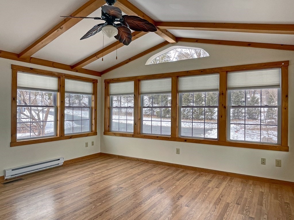 53 Burrows Turnpike Road Bernardston, MA 01337 - Photo 9 of 42 a view of an empty room with a window and wooden floor