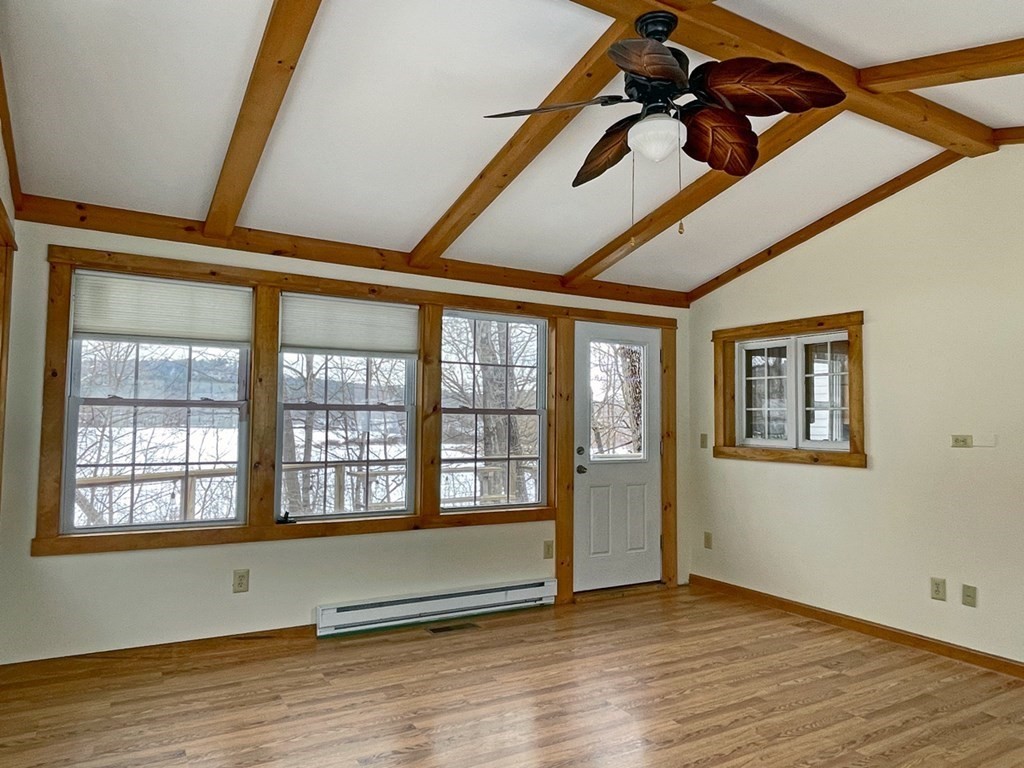 53 Burrows Turnpike Road Bernardston, MA 01337 - Photo 10 of 42 a view of an empty room with wooden floor and a window