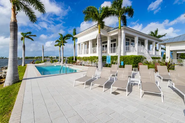 a view of pool with outdoor seating