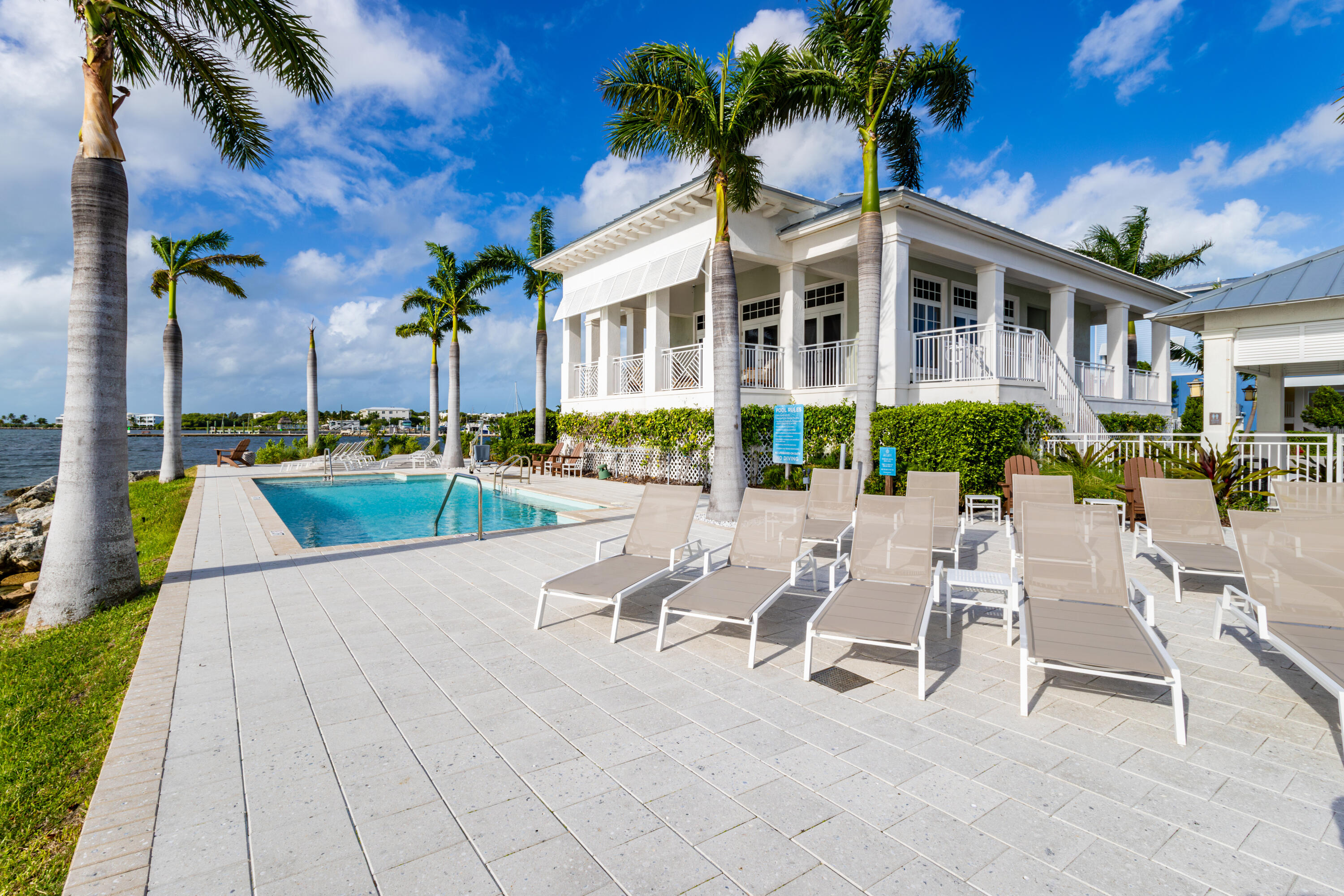 25 East Playa Largo Blvd Key Key Largo, FL 33037 - Photo 1 of 55 a view of pool with outdoor seating
