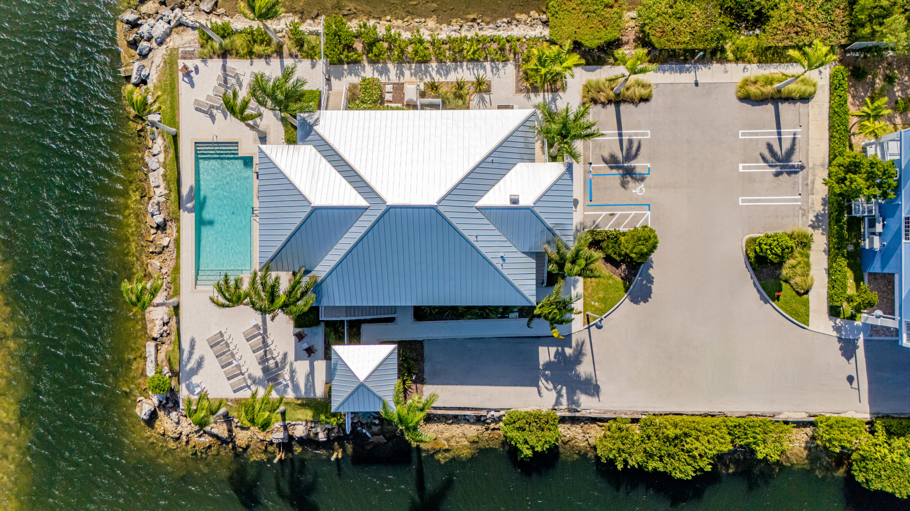 25 East Playa Largo Blvd Key Key Largo, FL 33037 - Photo 19 of 55 an aerial view of a house with a yard and outdoor seating