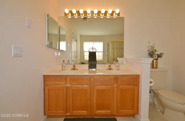 a bathroom with a tub and a sink