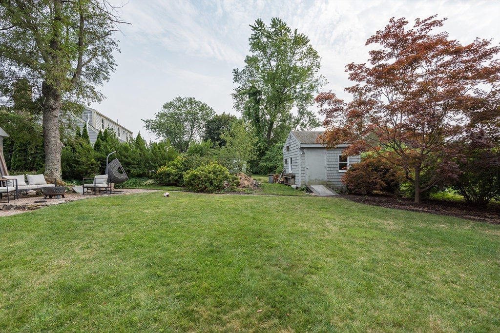 7 Robinson Road Woburn, MA 01801 - Photo 19 of 21 a view of backyard with green space