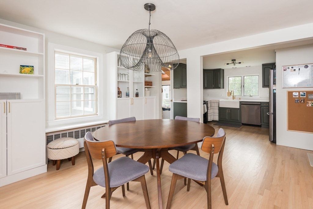 7 Robinson Road Woburn, MA 01801 - Photo 6 of 21 a view of a dining room with furniture and wooden floor