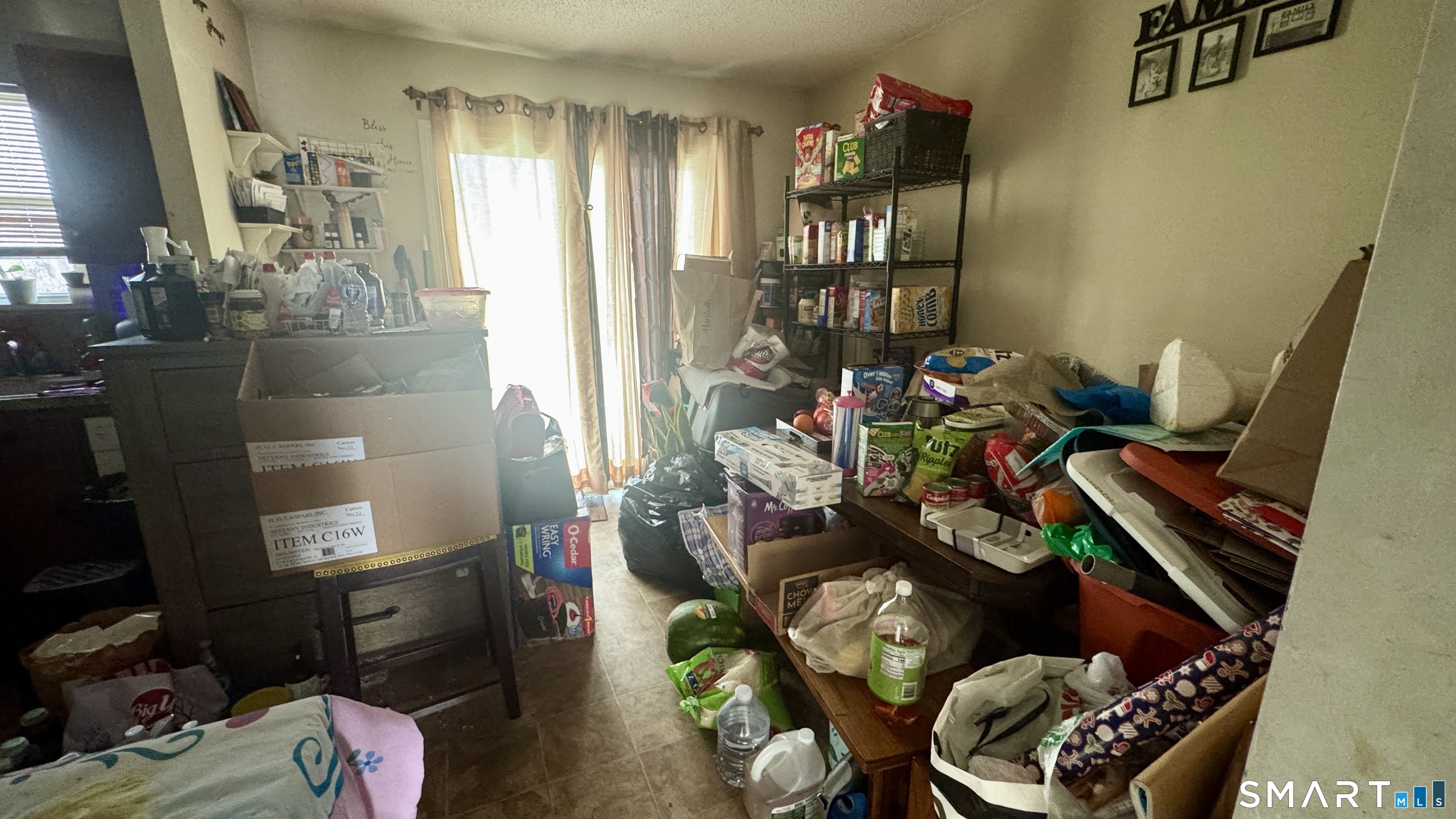 49 Ridge Road, Unit 2 Naugatuck, CT 06770 - Photo 18 of 18 a living room with furniture and a potted plant