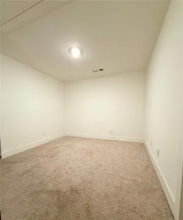 an empty room with a natural light