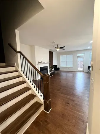 a view of an empty room with stairs