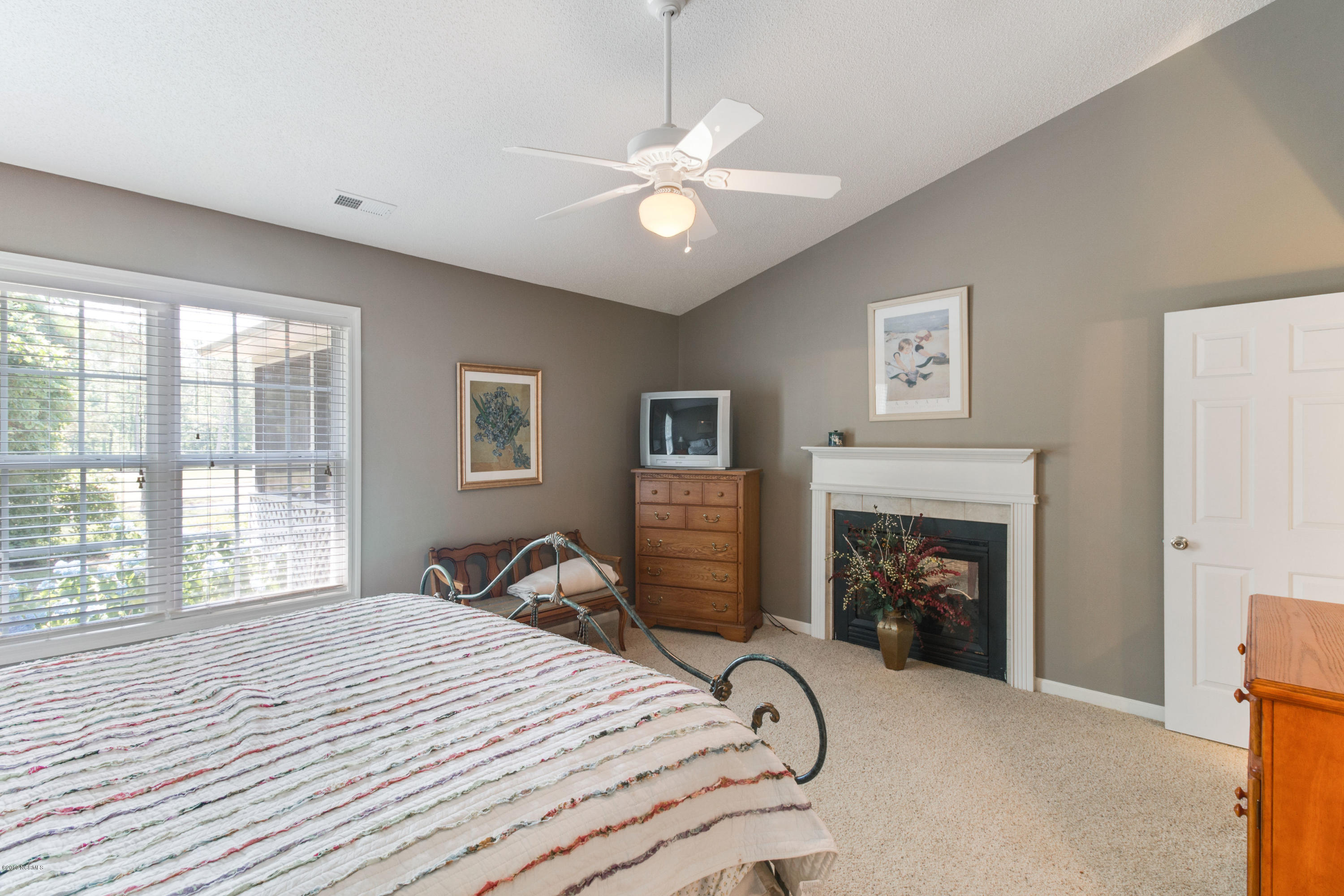 994 Mill Run Road Sneads Ferry, NC 28460 - Photo 12 of 38 Master Bedroom w Fireplace
