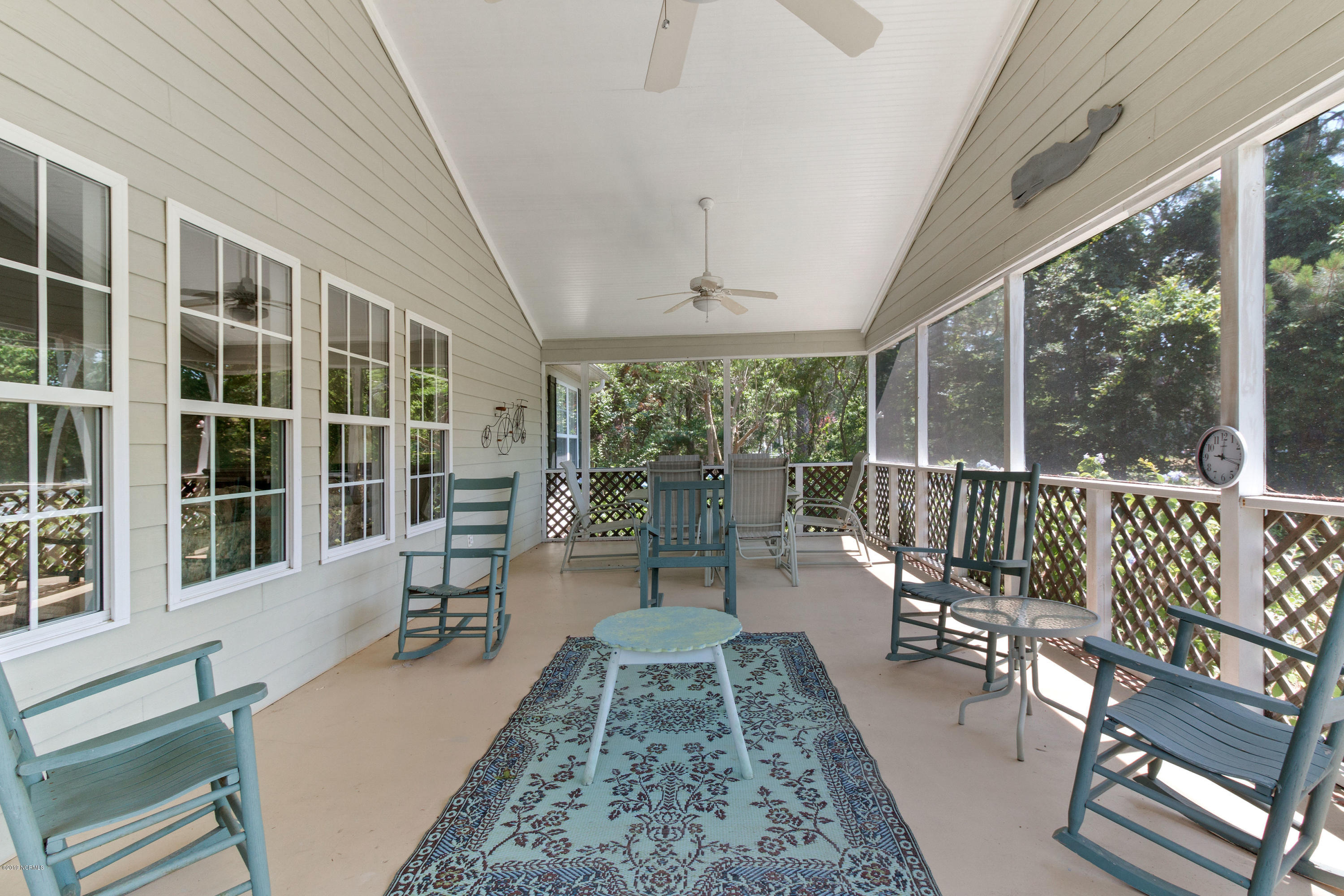 994 Mill Run Road Sneads Ferry, NC 28460 - Photo 15 of 38 Screened Back Porch overlooking Golf Course