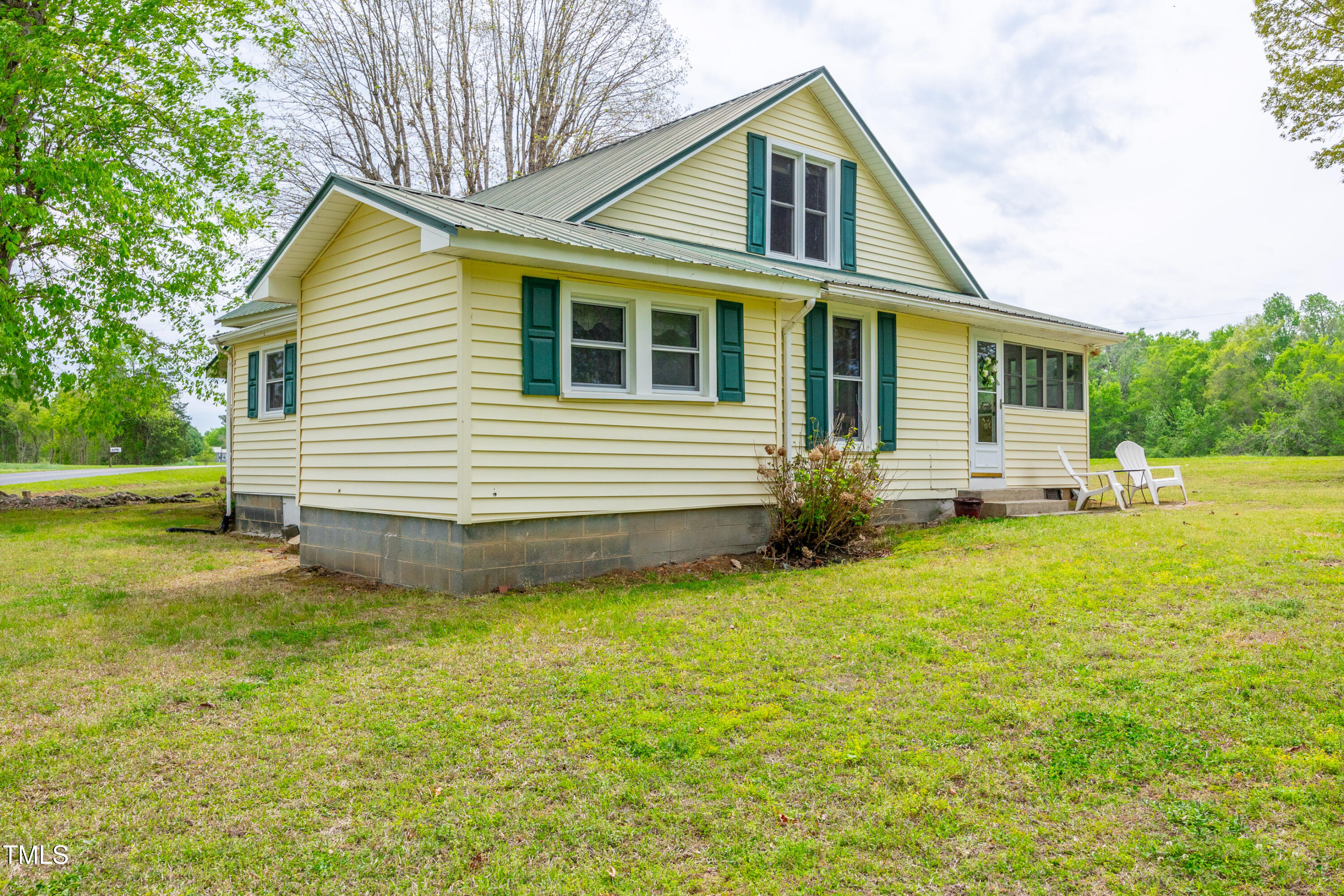 489 Purvis Farm Road Robbins, NC 27325 - Photo 28 of 32 a front view of house with yard and green space