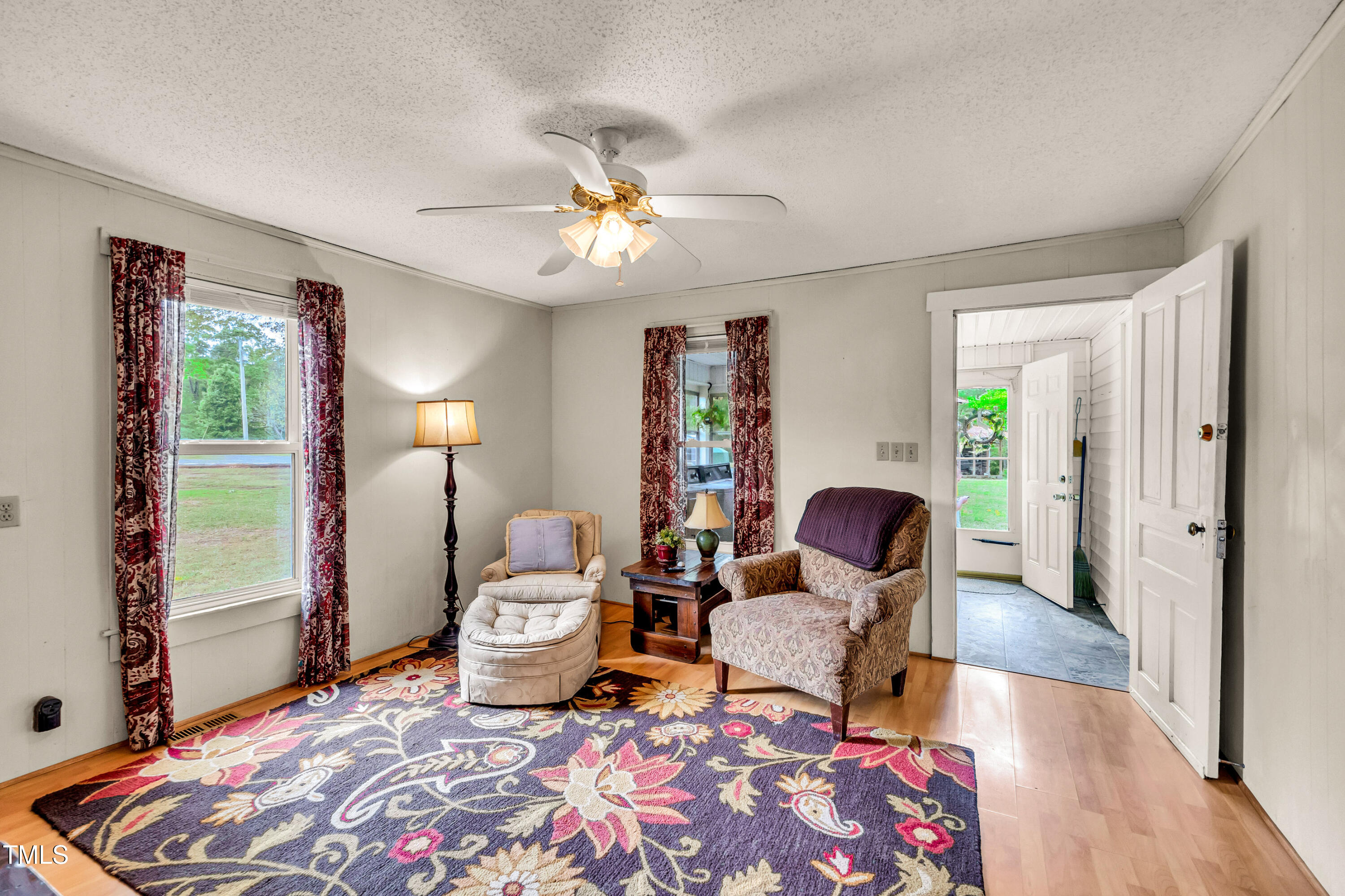 489 Purvis Farm Road Robbins, NC 27325 - Photo 8 of 32 a living room with furniture and wooden floor