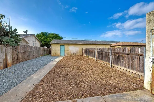 a view of backyard with green space