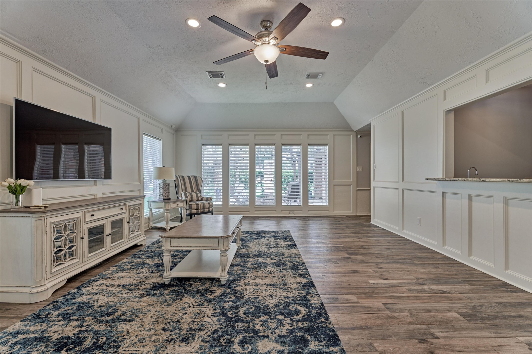 6522 Castle Pine Lane Spring, TX 77379 - Photo 31 of 49 a living room with furniture and a flat screen tv