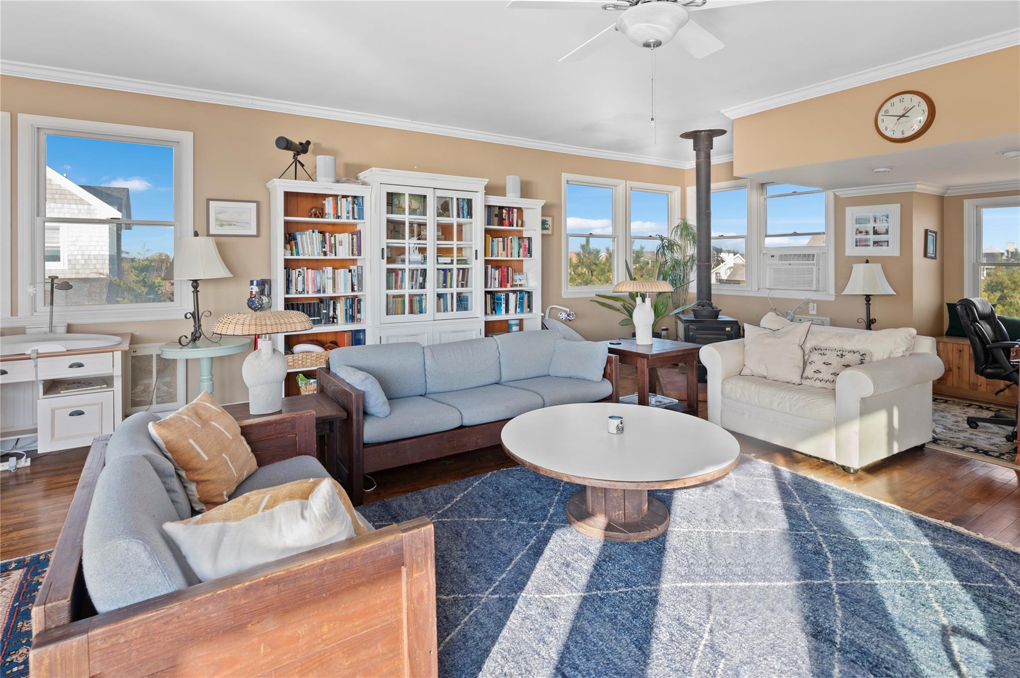400 Ocean View Walk Ocean Beach, NY 11770 - Photo 13 of 21 a living room with furniture a table and a large window