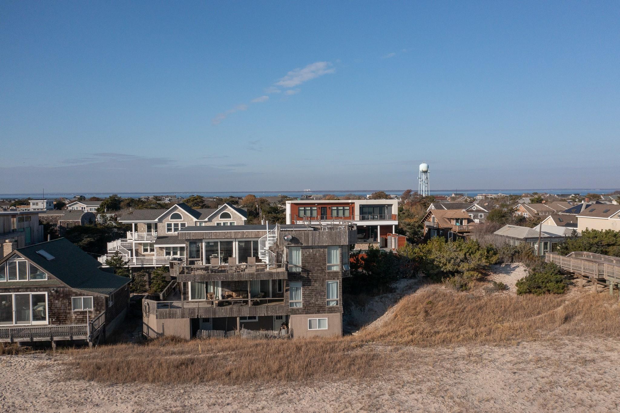 400 Ocean View Walk Ocean Beach, NY 11770 - Photo 4 of 21 an aerial view of a house with a yard